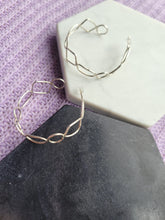 Load image into Gallery viewer, Geometric Repeating Shapes Silver Hoops
